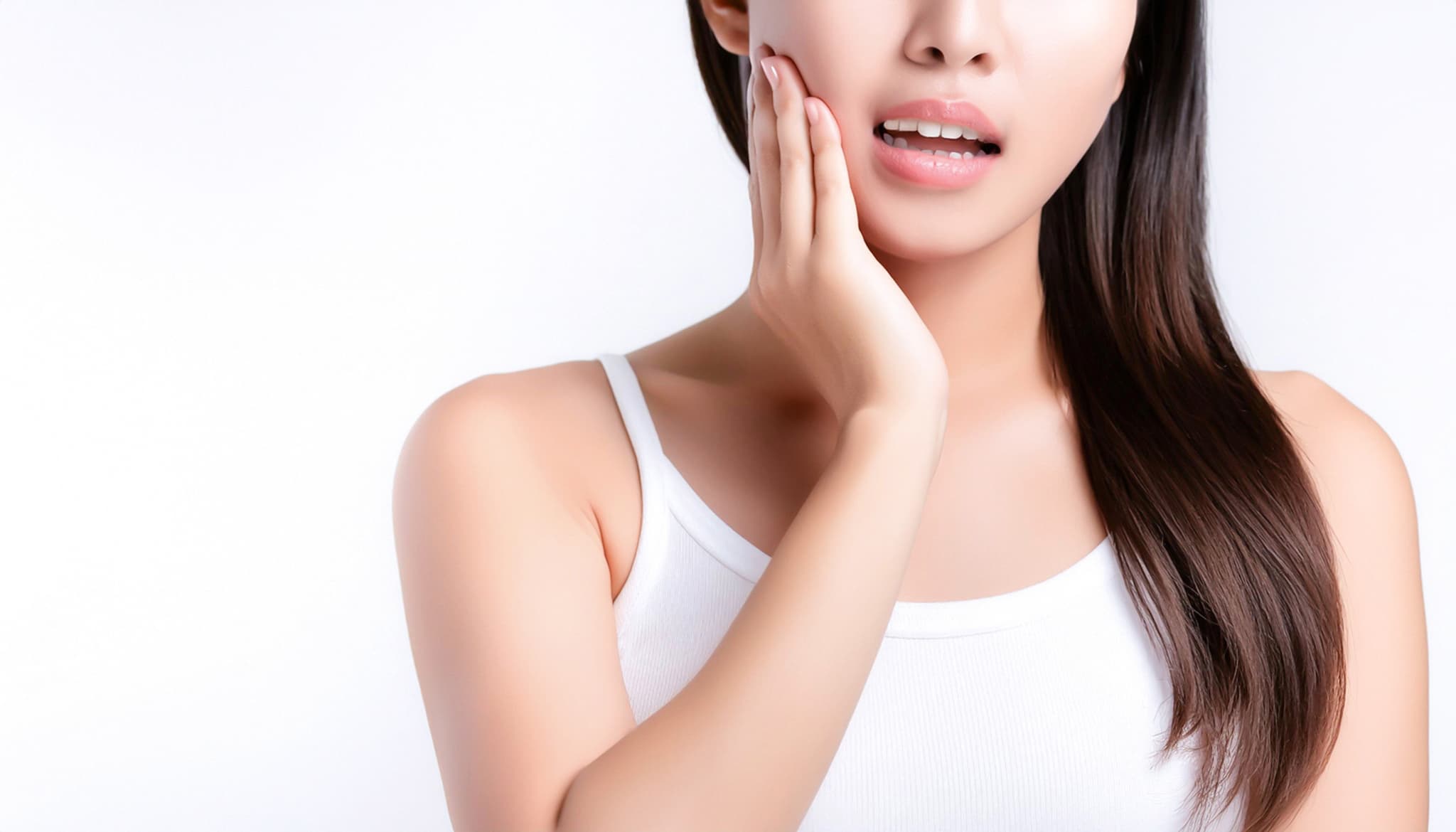 セラミック治療後の歯が痛いと感じる女性