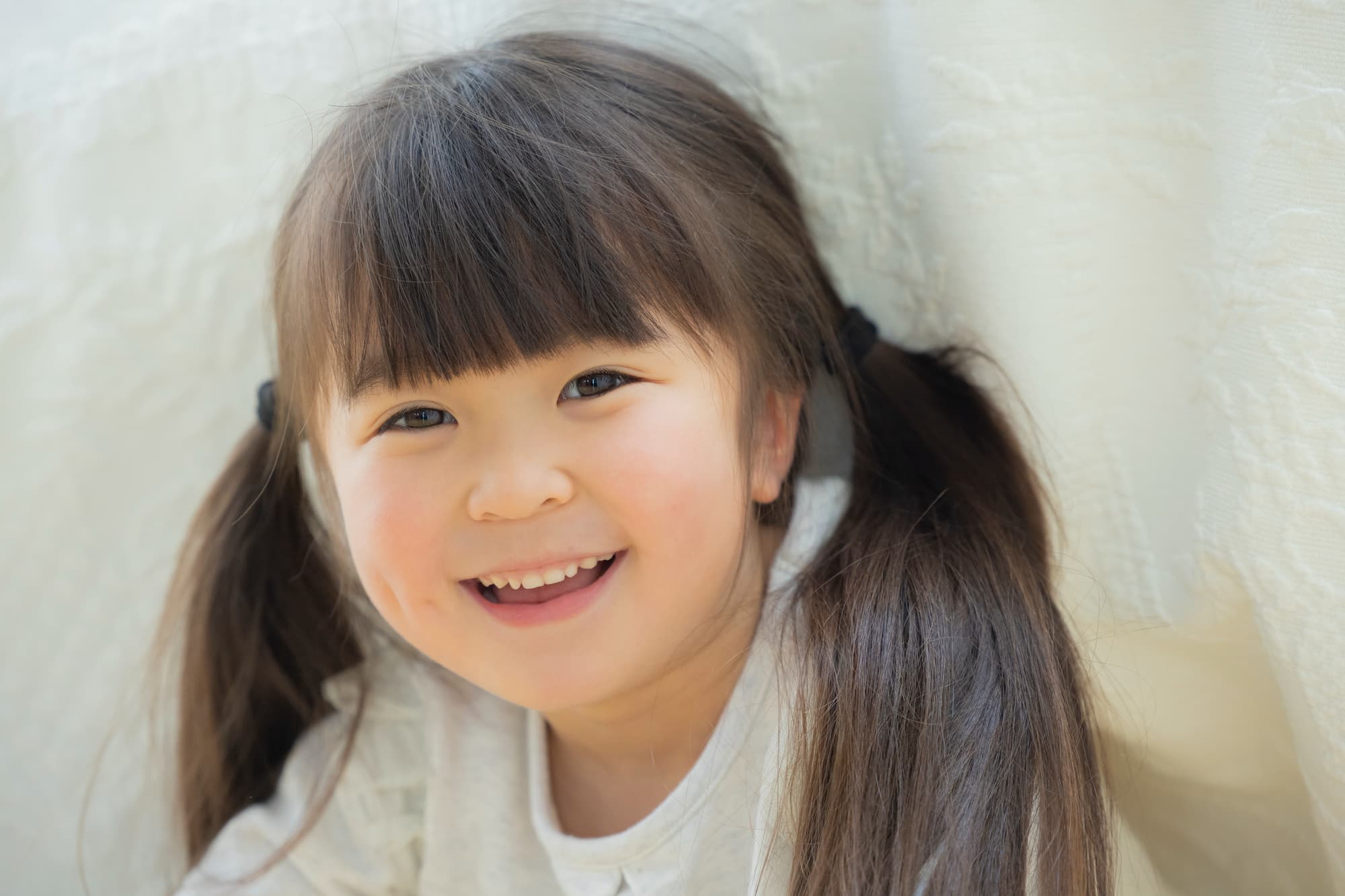 マイオブレースで歯列が整い笑顔で過ごす子ども