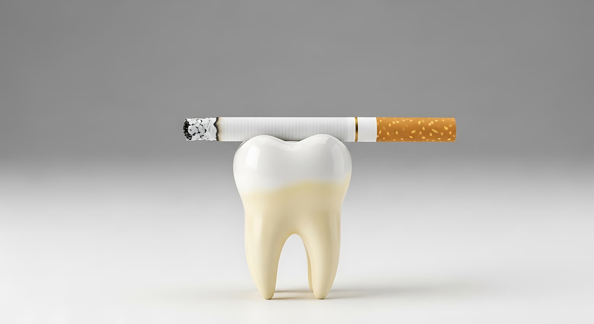 喫煙が歯に及ぼす影響を示すイメージ